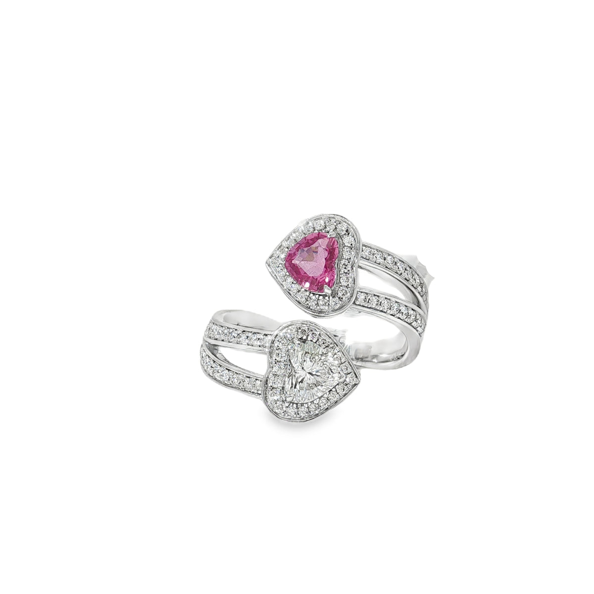 White gold open ring with opposing pink sapphire and diamond hearts in diamond halos