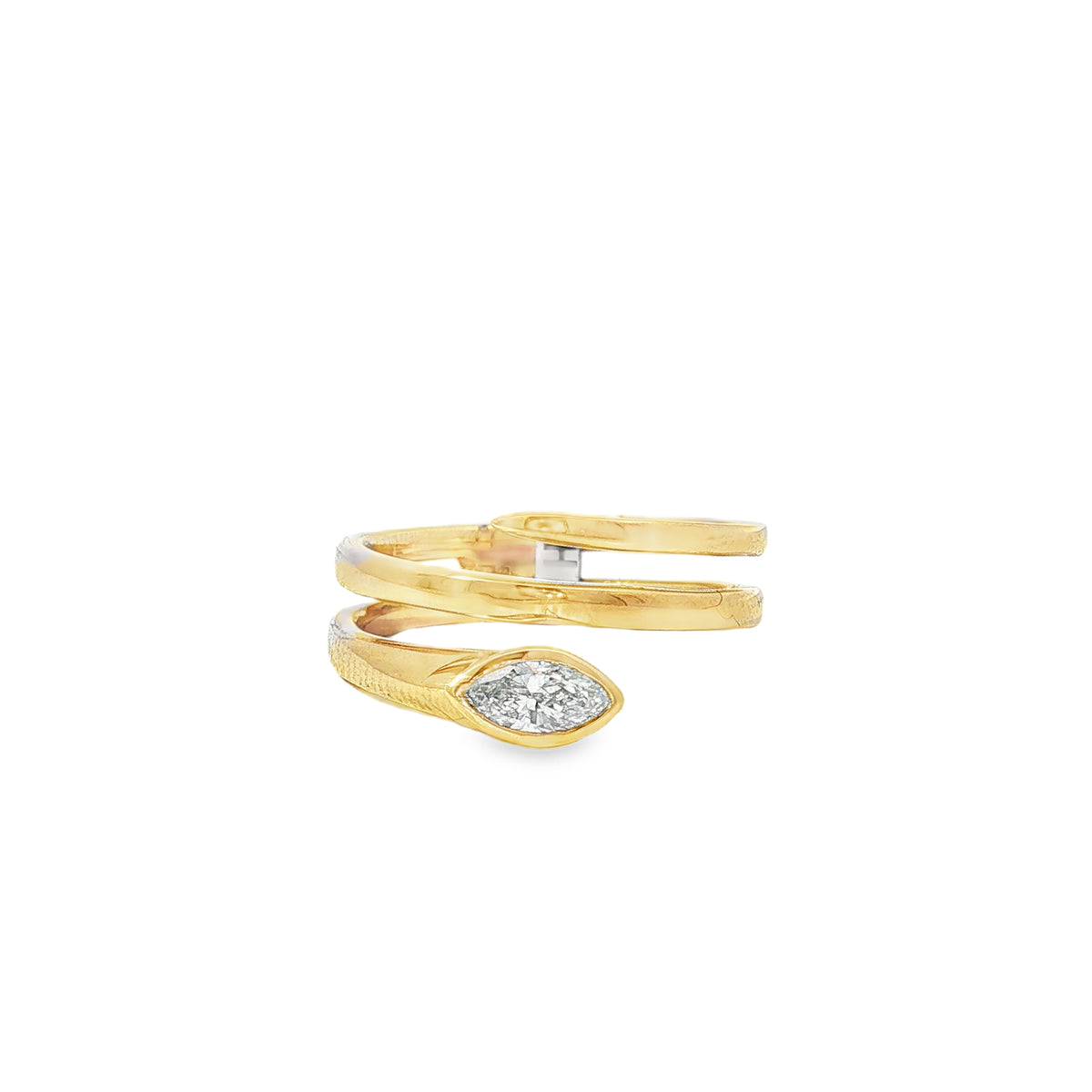 Yellow gold three-turn coil ring ending in a bezel-set marquise diamond