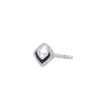 Angled view of sapphire lozenge ring showing open centre and diamond-set shoulders