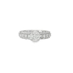 White gold broad diamond ring with raised mixed-cut cluster and diamond-framed shoulders