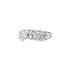 Angled view of diamond cluster ring showing raised centre and layered diamond shoulders