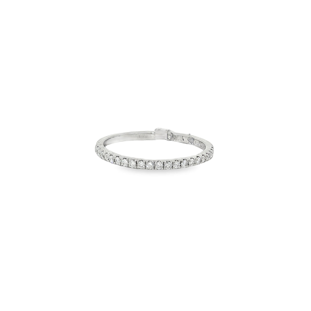 White gold slim ring with round diamonds across the front of the band