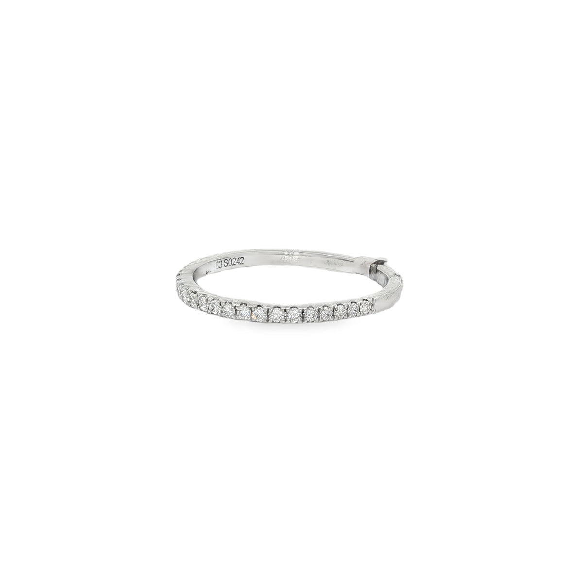 Angled view of slim diamond ring showing the plain rear section of the band
