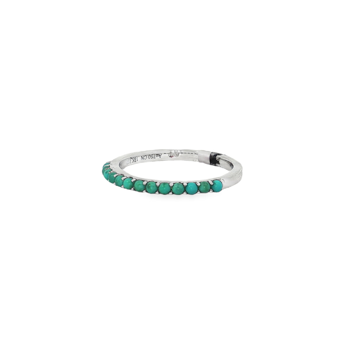 Angled view of turquoise stone row ring showing smooth white gold rear band