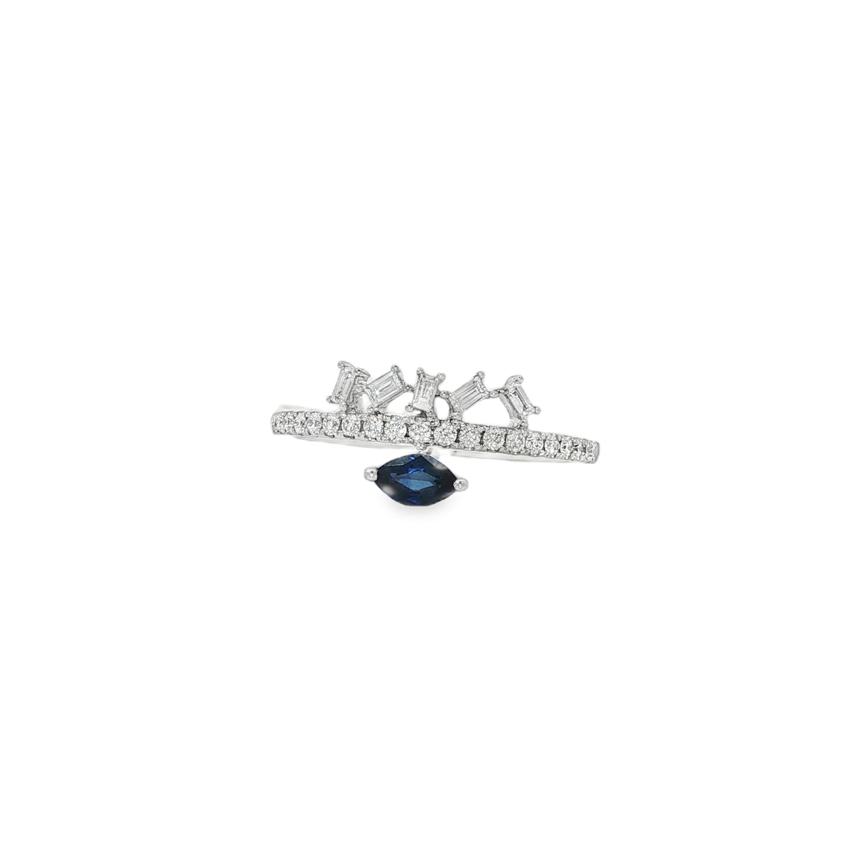 White gold ring with marquise-shaped sapphire below round diamonds and an angled baguette crown