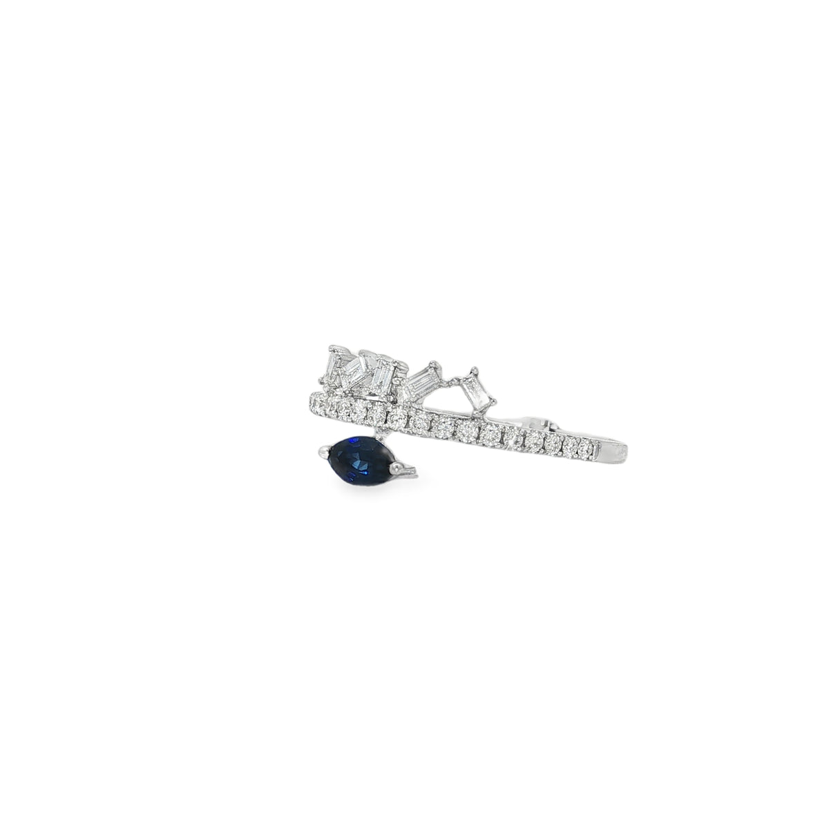 Angled view of sapphire crown ring showing raised baguettes and the blue stone below the band